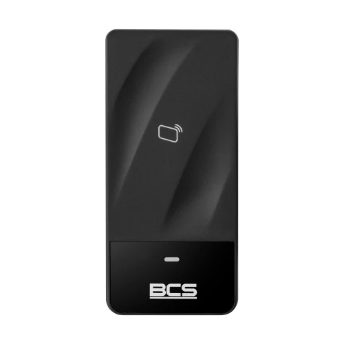 Czarny czytnik RFID z logo BCS na dole i ikoną karty zbliżeniowej na środku. Urządzenie ma prostokątny kształt z delikatnymi falistymi wzorami na powierzchni.