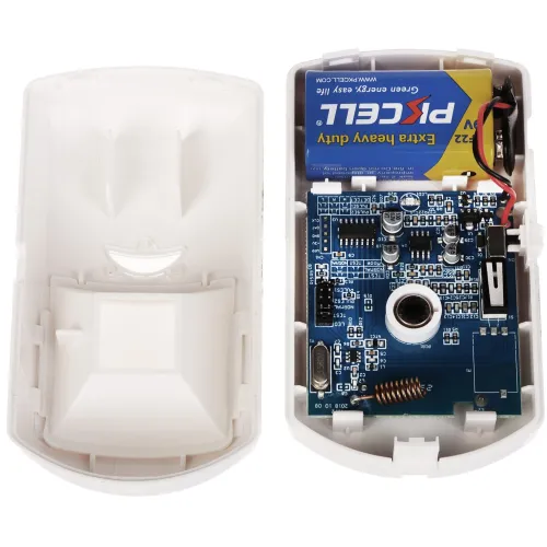 Wnętrze białej obudowy elektronicznego urządzenia z widoczną płytką drukowaną i baterią. Płytka zawiera różne komponenty elektroniczne, a obudowa jest otwarta, ukazując szczegóły konstrukcji.