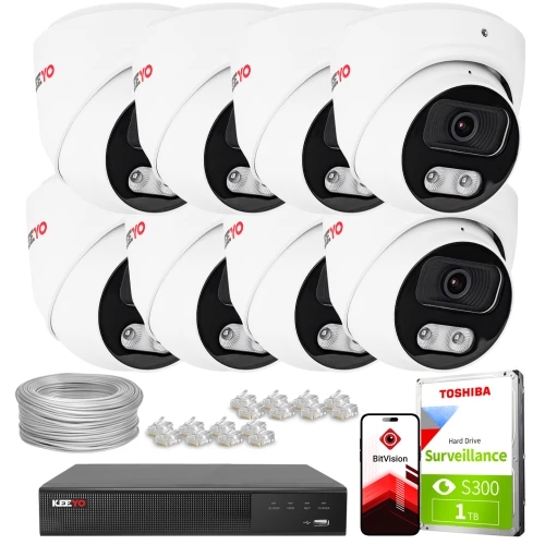 Zestaw do monitoringu składający się z ośmiu białych kamer, rejestratora, dysku twardego Toshiba 1TB oraz akcesoriów montażowych. Na zdjęciu widoczne są również przewody i złącza sieciowe.