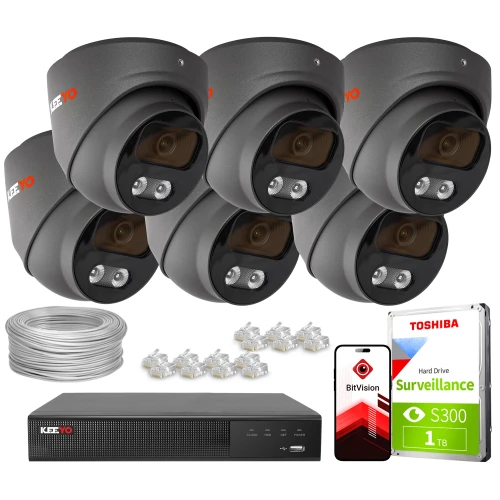 Na zdjęciu znajduje się zestaw do monitoringu, który obejmuje sześć kamer, rejestrator, dysk twardy Toshiba oraz akcesoria takie jak kable i złącza. Obok sprzętu widoczny jest również telefon z aplikacją BitVision.