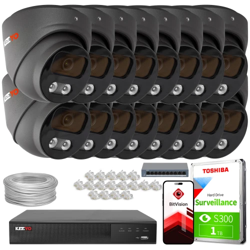 Zestaw do monitoringu składający się z dwunastu kamer, rejestratora, dysku twardego Toshiba 1TB, kabla oraz akcesoriów montażowych. Na zdjęciu widoczny jest również telefon z aplikacją BitVision.